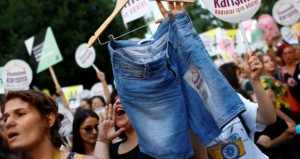 Women rights activists display shorts with a slogan that reads: "Don't Mess With My Outfit" during a protest against what they say are violence and animosity they face from men demanding they dress more conservatively, in Istanbul